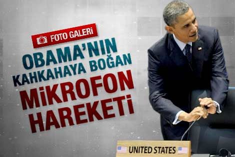 Obama'nın kahkahaya boğan mikrofon hareketi