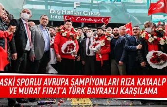 ASKİ sporlu Avrupa şampiyonları Rıza Kayaalp ve Murat Fırat'a Türk bayraklı karşılama