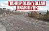 Tahrip olan yollar onarılıyor!